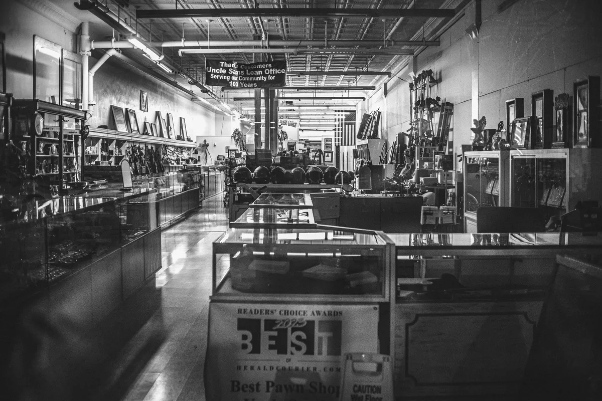 Antique pawn shop interior filled with various items, reflecting the atmosphere for pawning luxury watches.